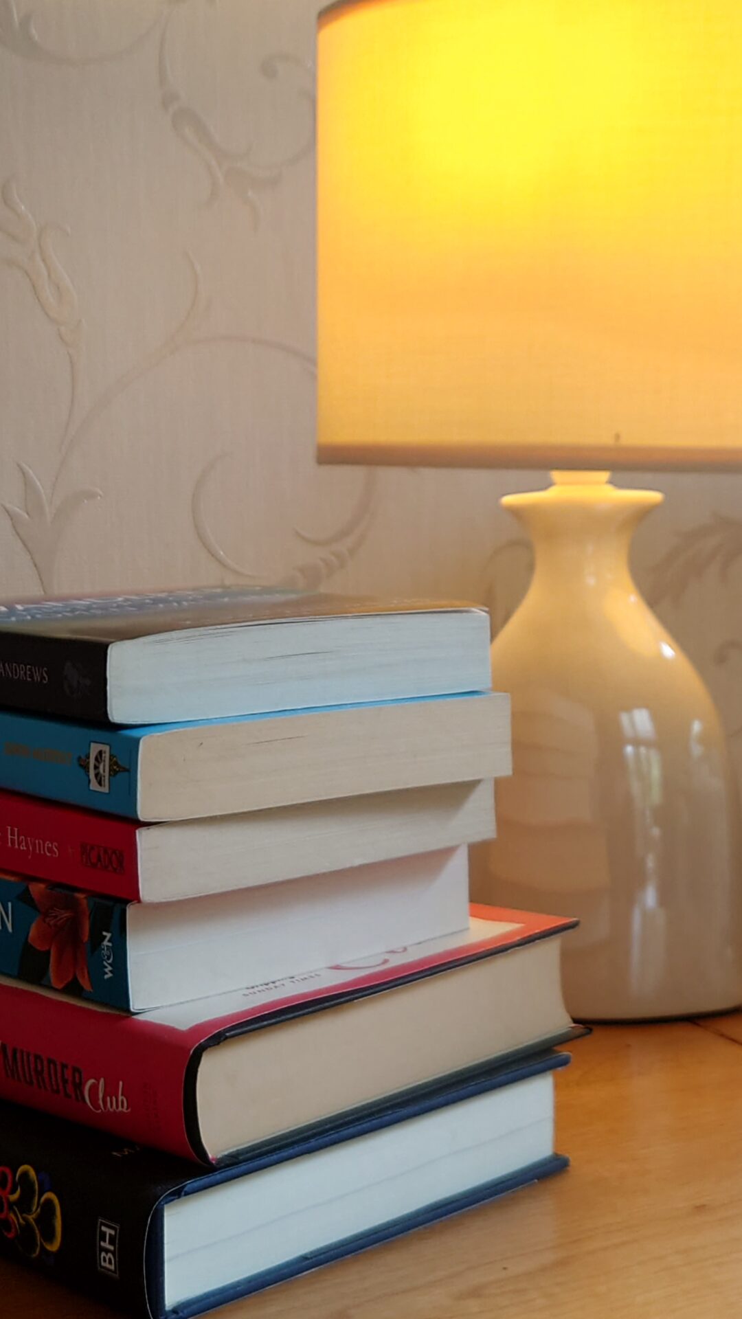 Pile of books and lamp