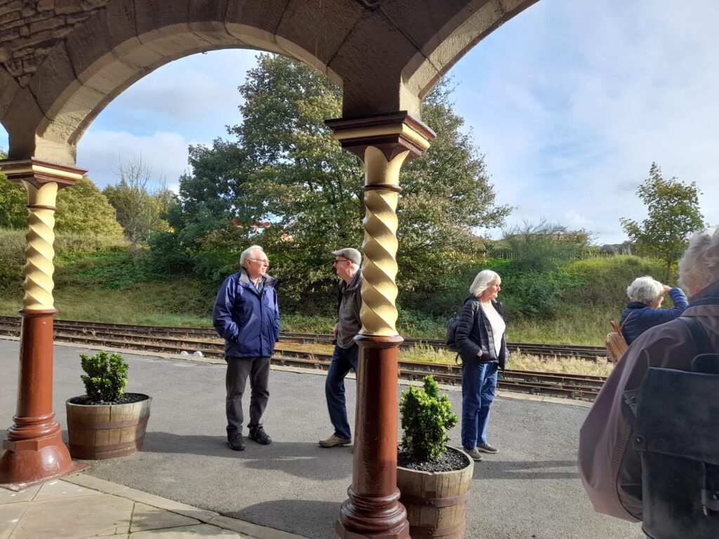 people on railway station at Beamish