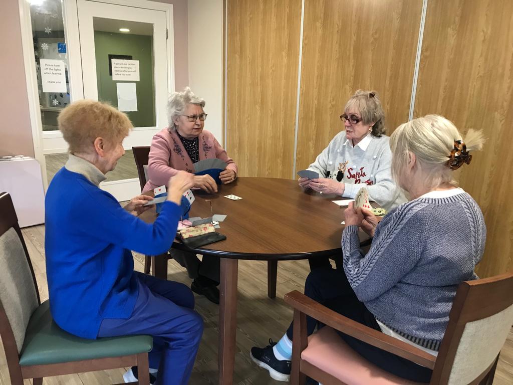 Four people playing whist